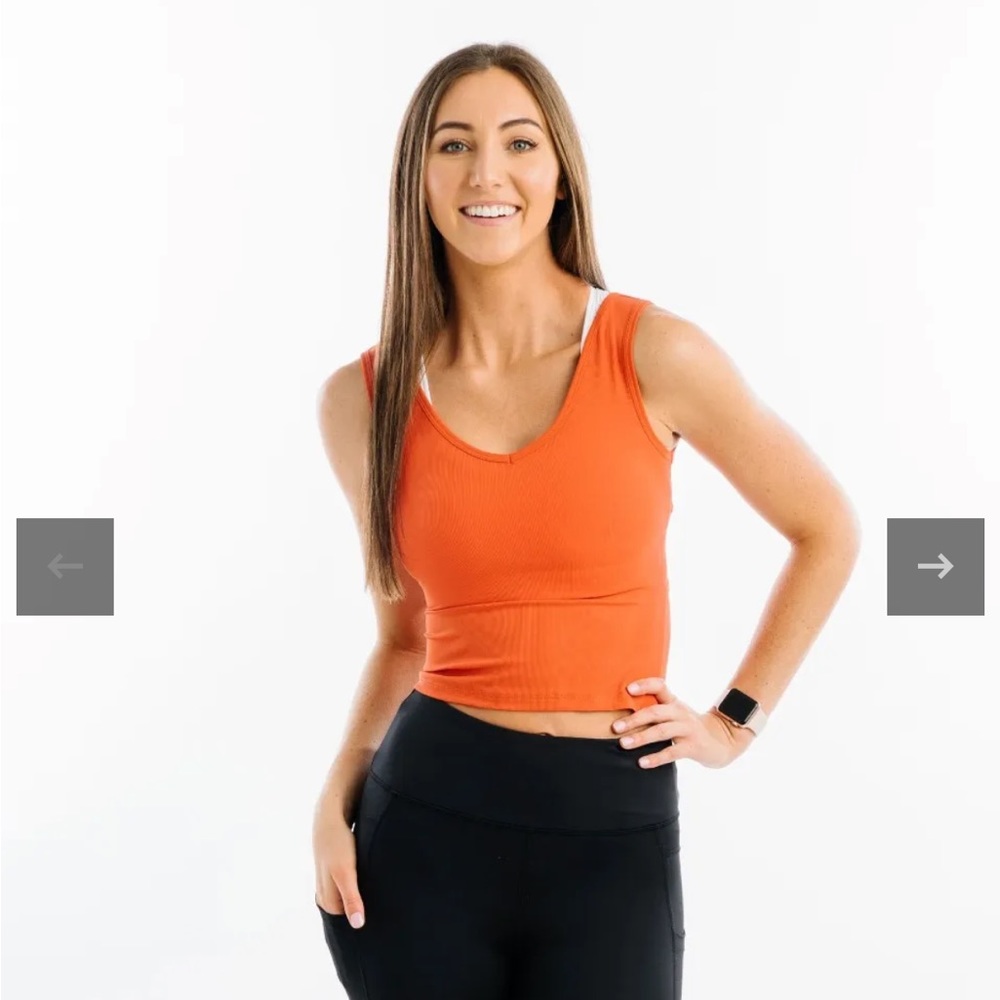 ZYIA orange ribbed cutout tank